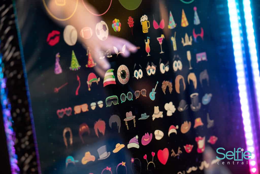 Interactive digital emoji and icon display at Selfie Central photo booth in Auckland.