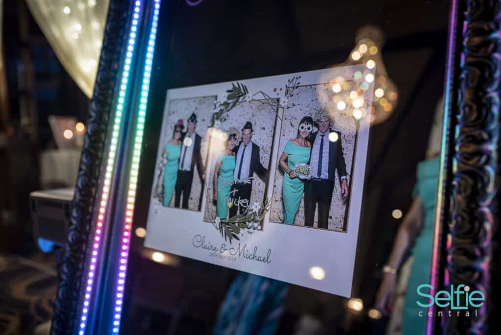 Selfie Central photo booth with vibrant LED lights at an event in Auckland.