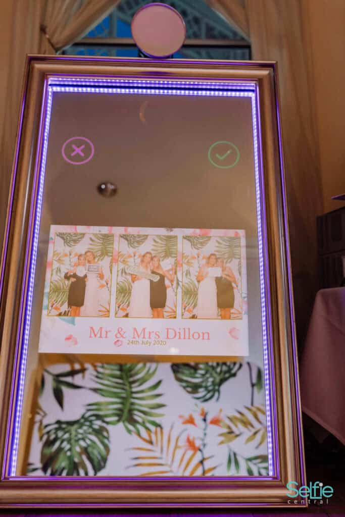 Modern photo booth with LED lighting for events in Auckland, New Zealand.