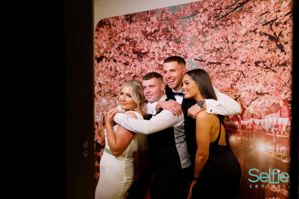 Selfie Central photo booth with group of friends at an event in Auckland.